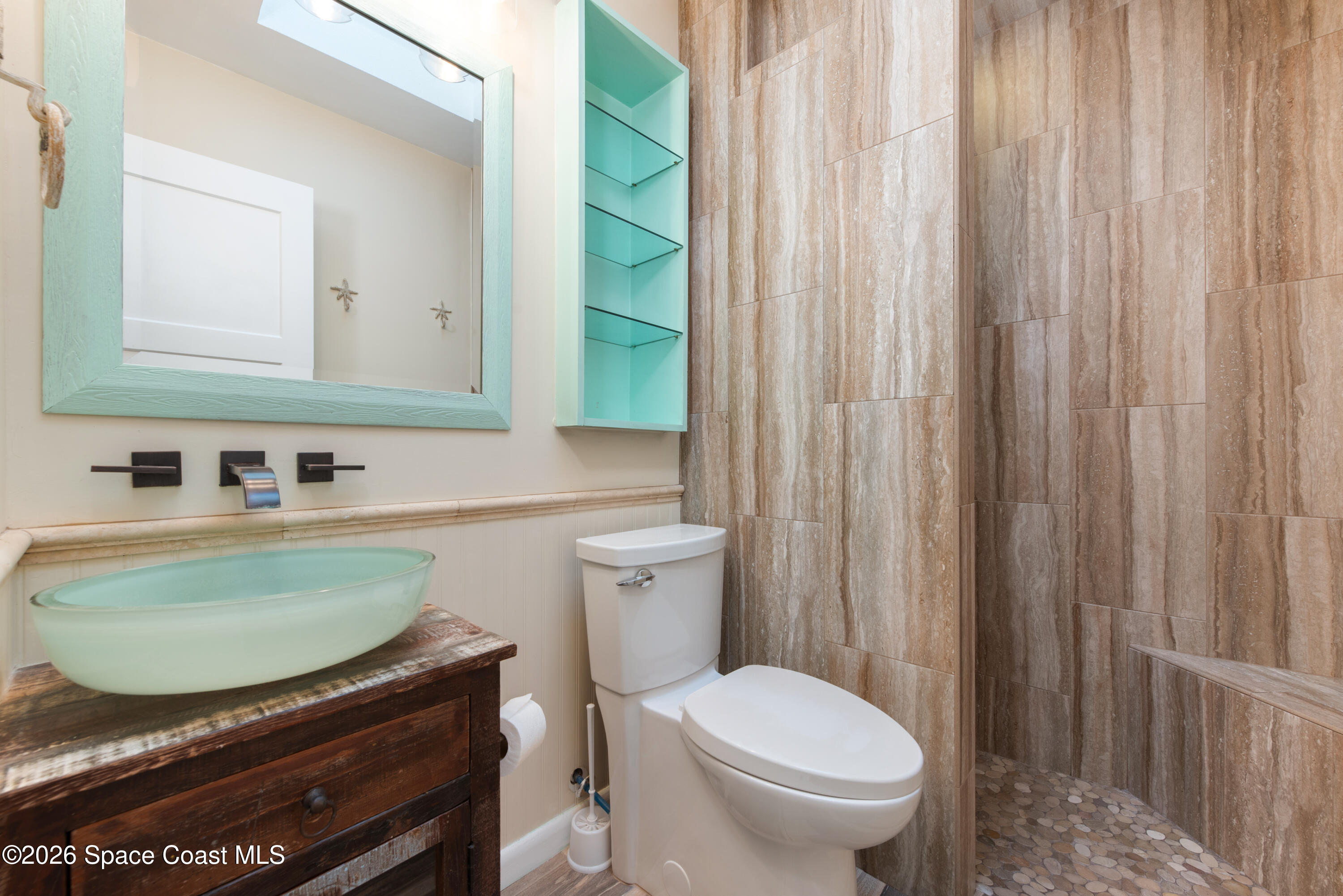 331 Avenida Del Sol Indialantic, FL 32903 - Photo 26 of 51 a bathroom with a sink toilet and shower