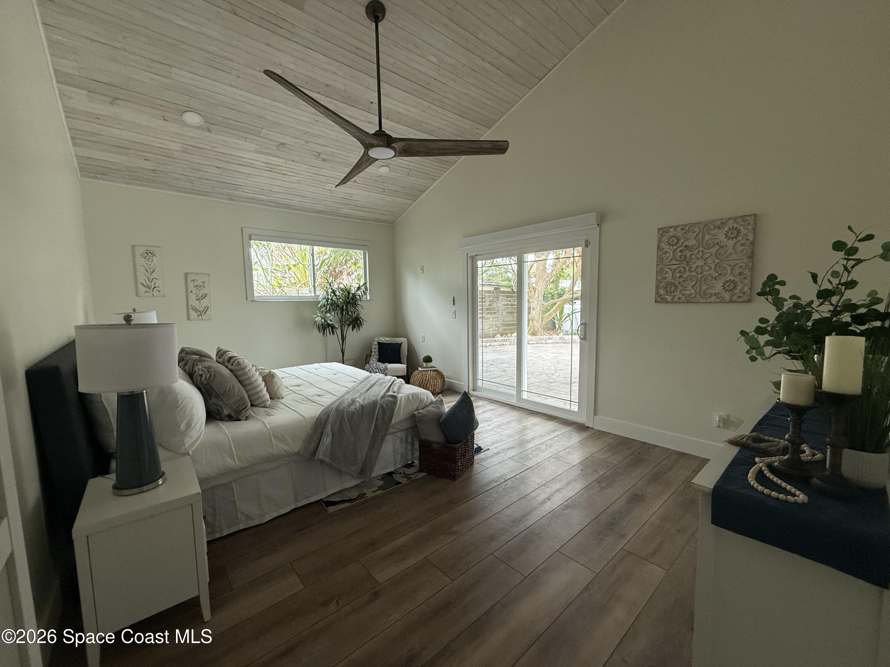 331 Avenida Del Sol Indialantic, FL 32903 - Photo 28 of 51 a living room with furniture window and a wooden floor