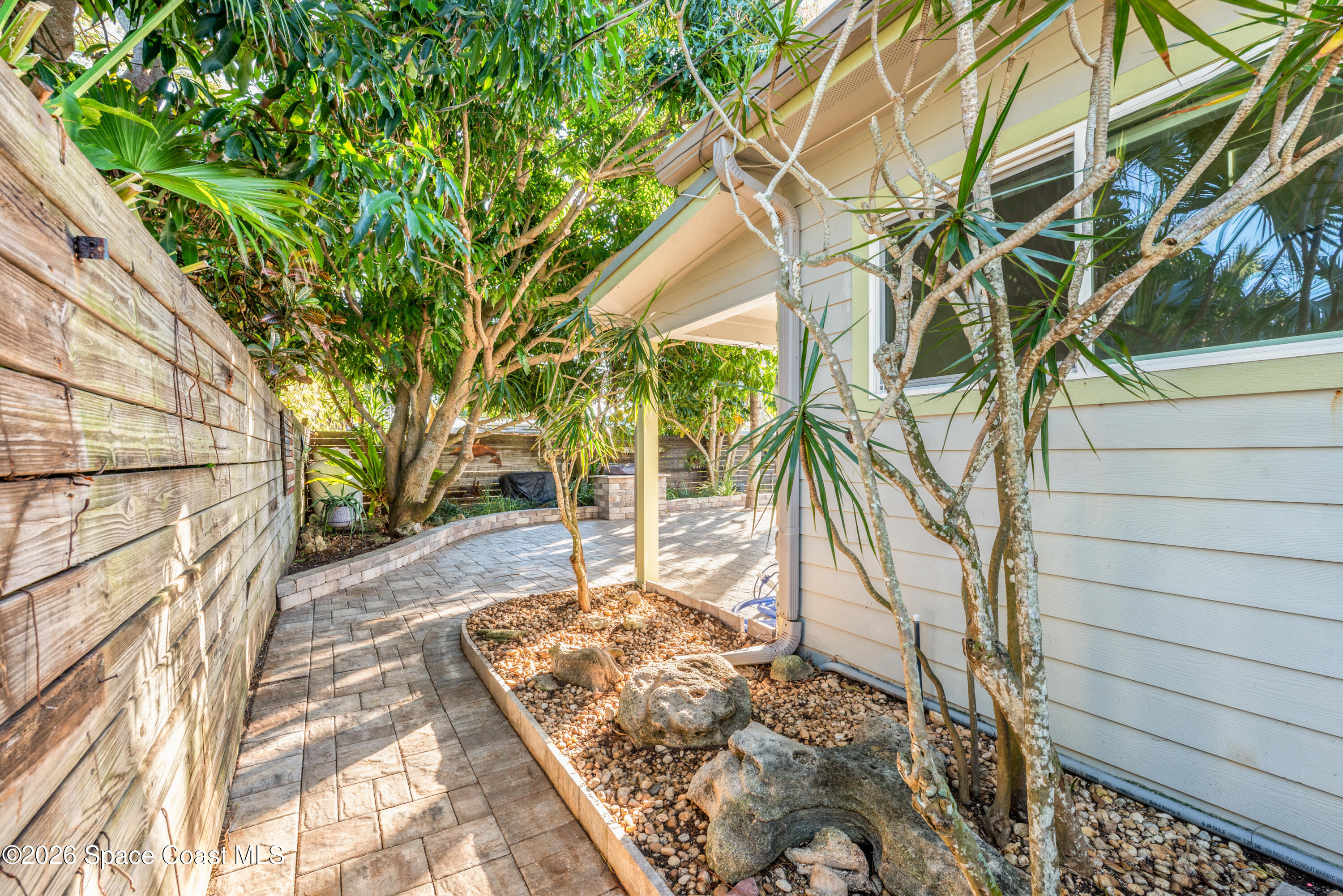 331 Avenida Del Sol Indialantic, FL 32903 - Photo 39 of 51 a view of a yard with plants and trees