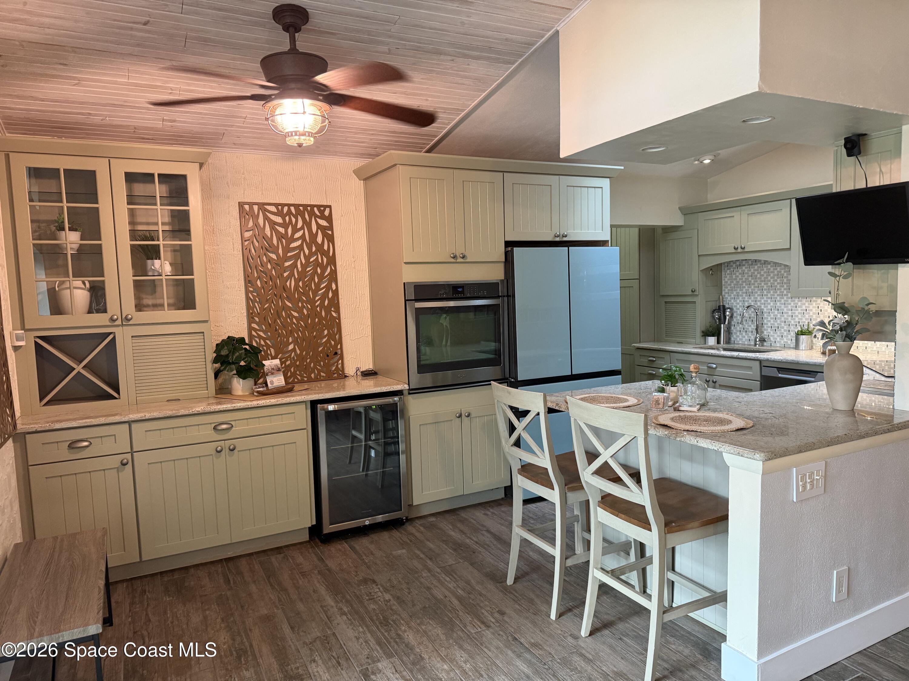 331 Avenida Del Sol Indialantic, FL 32903 - Photo 10 of 51 a kitchen with a sink cabinets and window