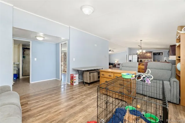 a dining table chairs and a kitchen view