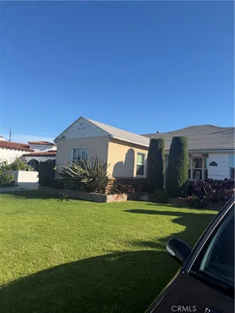 a view of a house with a big yard