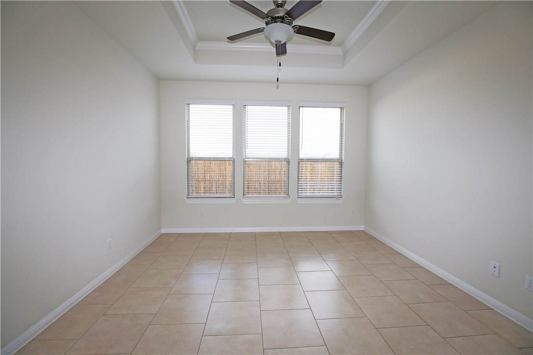 15912 Cessida Street Austin, TX 78728 - Photo 13 of 23 a view of an empty room with a window