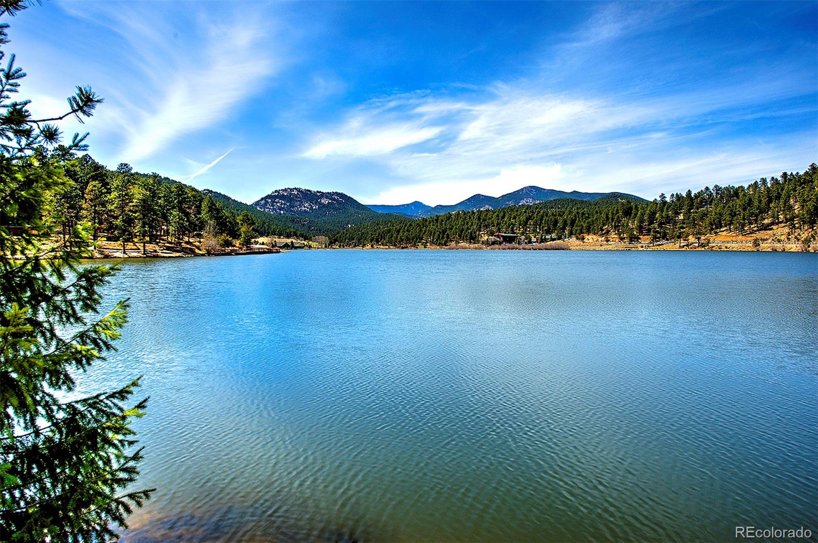 6855 Lynx Lair Road Evergreen, CO 80439 - Photo 10 of 14 a view of lake and mountain
