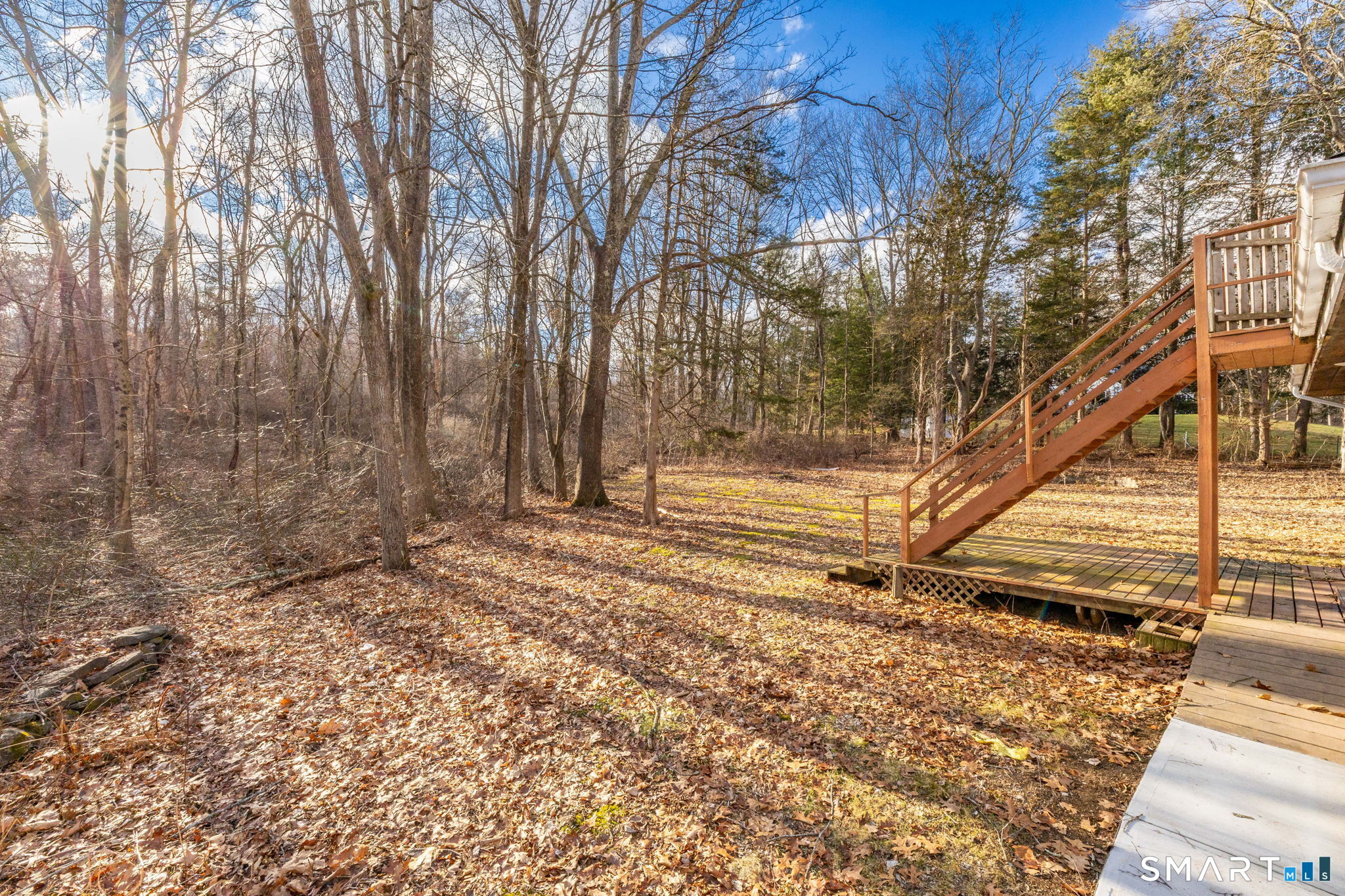 461 Pond Road Franklin, CT 06254 - Photo 29 of 35 a view of backyard with wooden fence