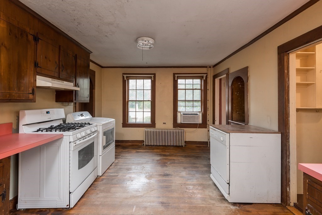 716 High Street Hanson, MA 02341 - Photo 6 of 21 a kitchen with a stove oven and sink