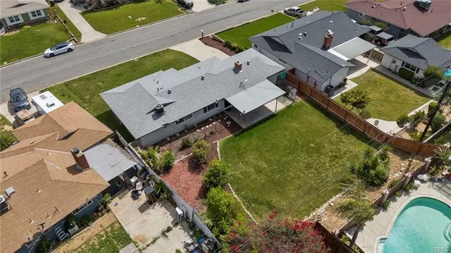 an aerial view of a house with a garden