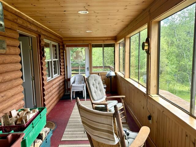 156 Hussey Road Parsonsfield, ME 04047 - Photo 10 of 25 10. Three Season Porch - Right side