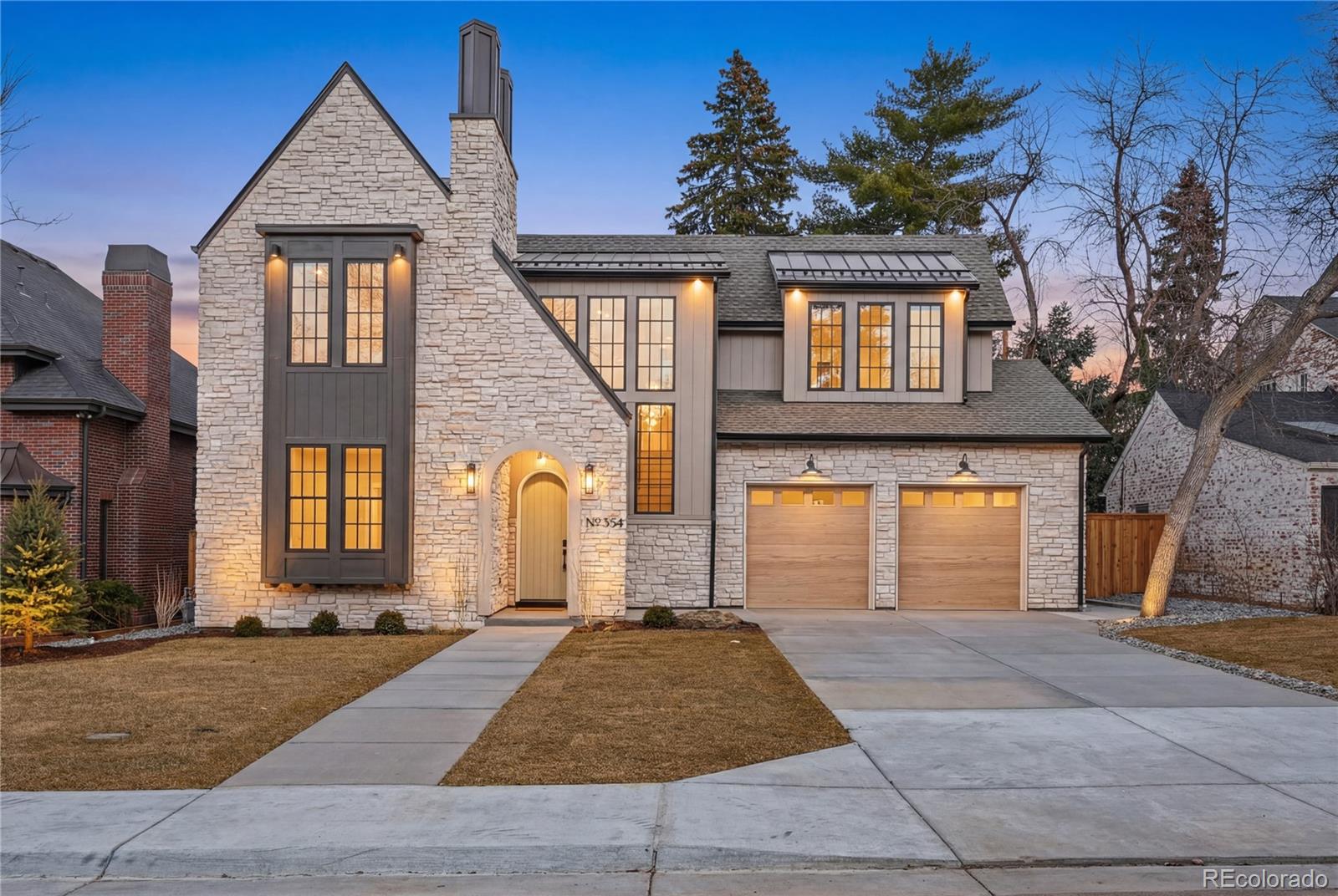354 Cherry Street Denver, CO 80220 - Photo 1 of 44 a front view of a house