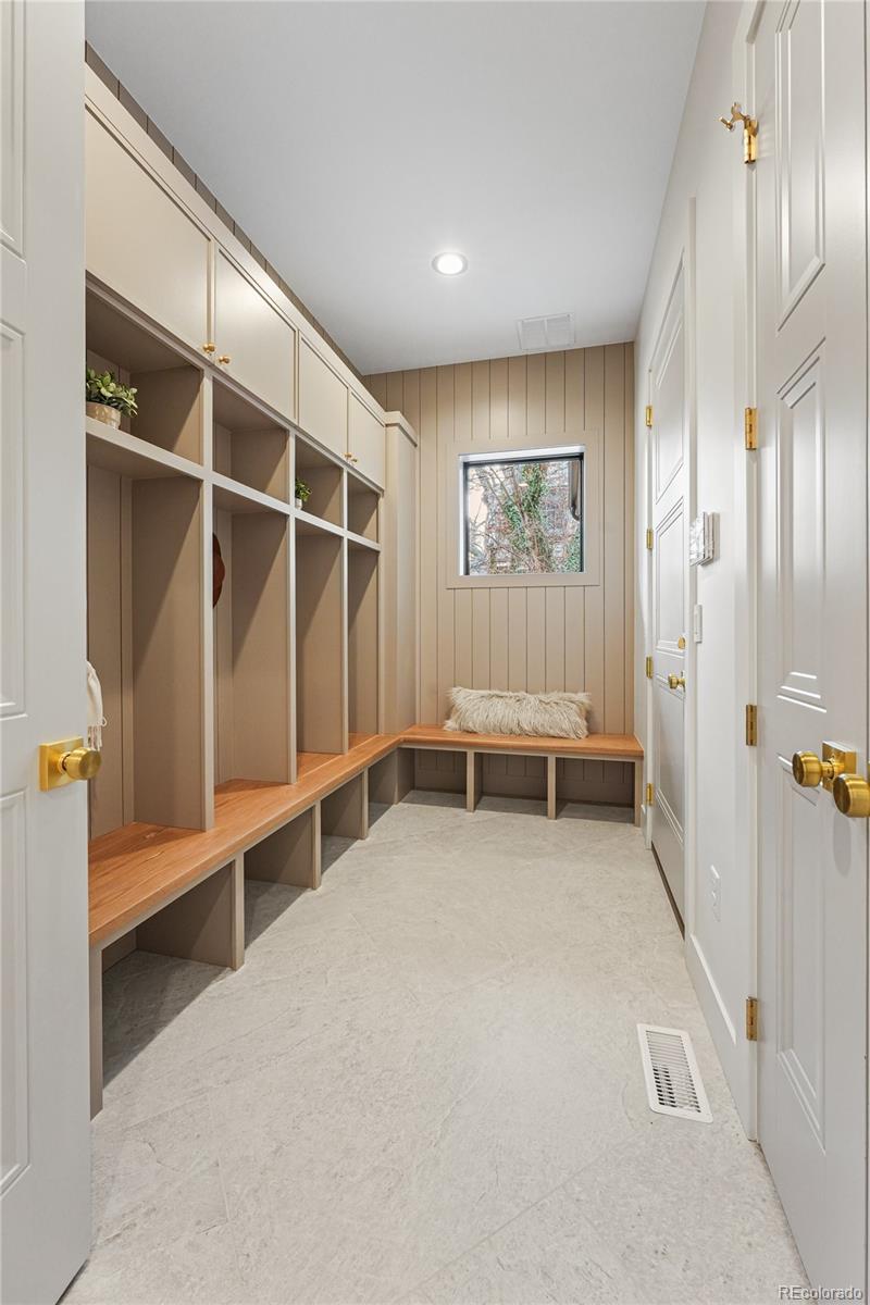 354 Cherry Street Denver, CO 80220 - Photo 22 of 44 a view of an empty room with a fireplace