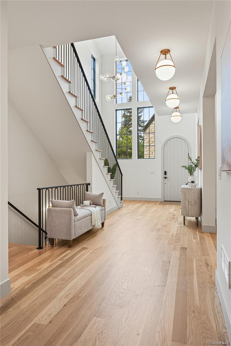 354 Cherry Street Denver, CO 80220 - Photo 24 of 44 a view of entryway and hall with wooden floor