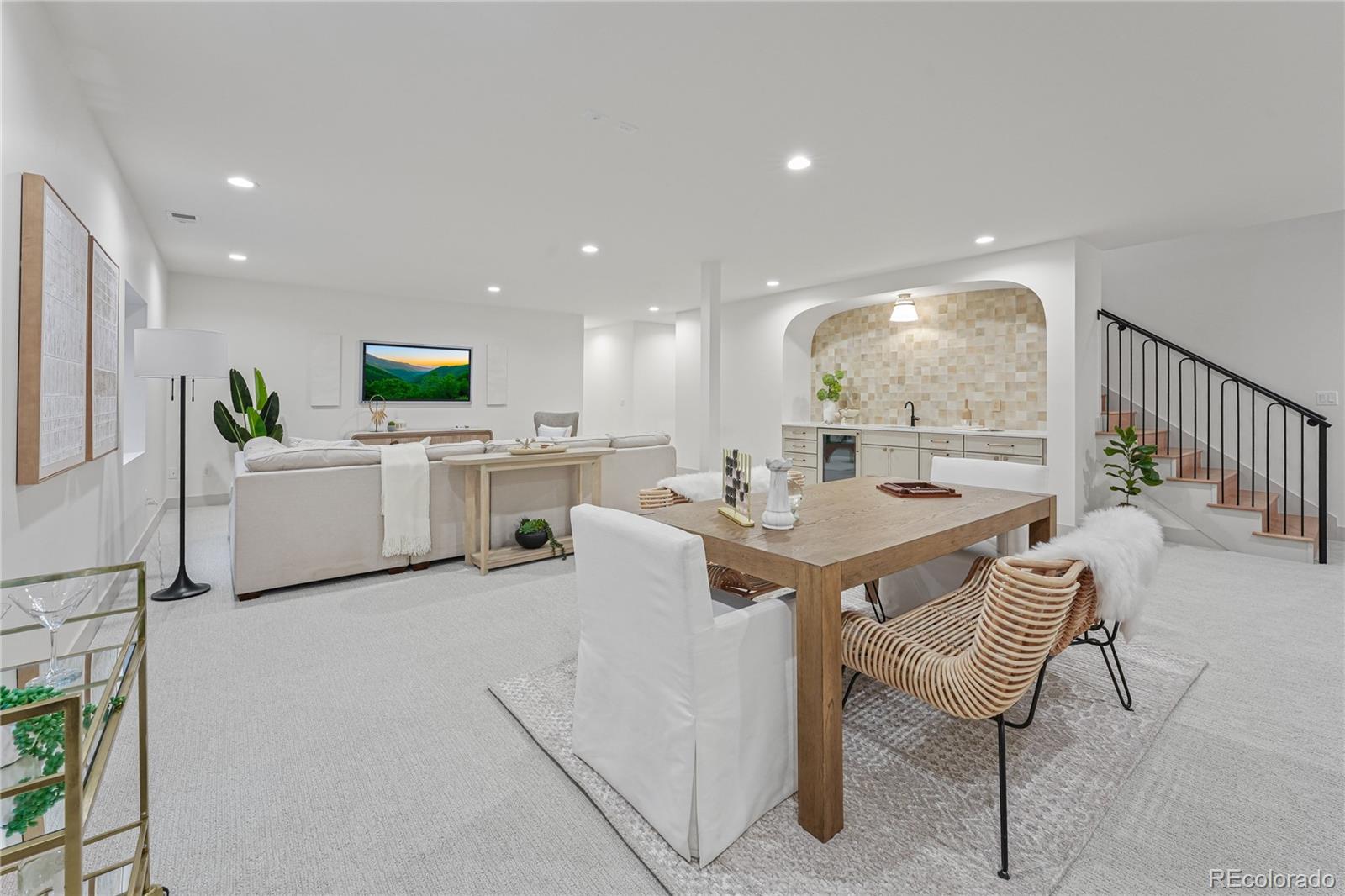 354 Cherry Street Denver, CO 80220 - Photo 33 of 44 a living room with furniture a dining table and a potted plant