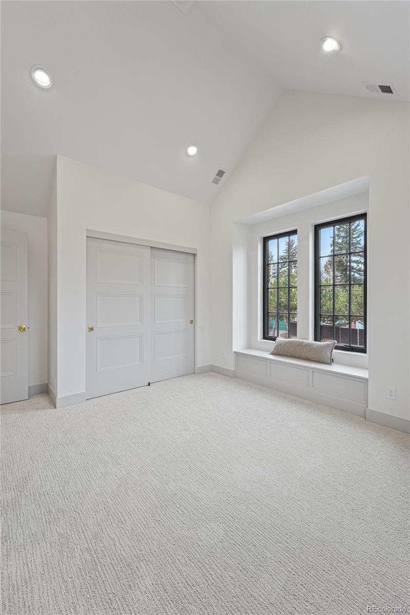 354 Cherry Street Denver, CO 80220 - Photo 38 of 44 a view of an empty room with a window