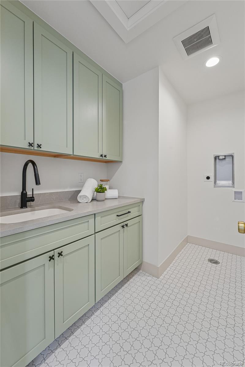 354 Cherry Street Denver, CO 80220 - Photo 40 of 44 a kitchen with sink and cabinets