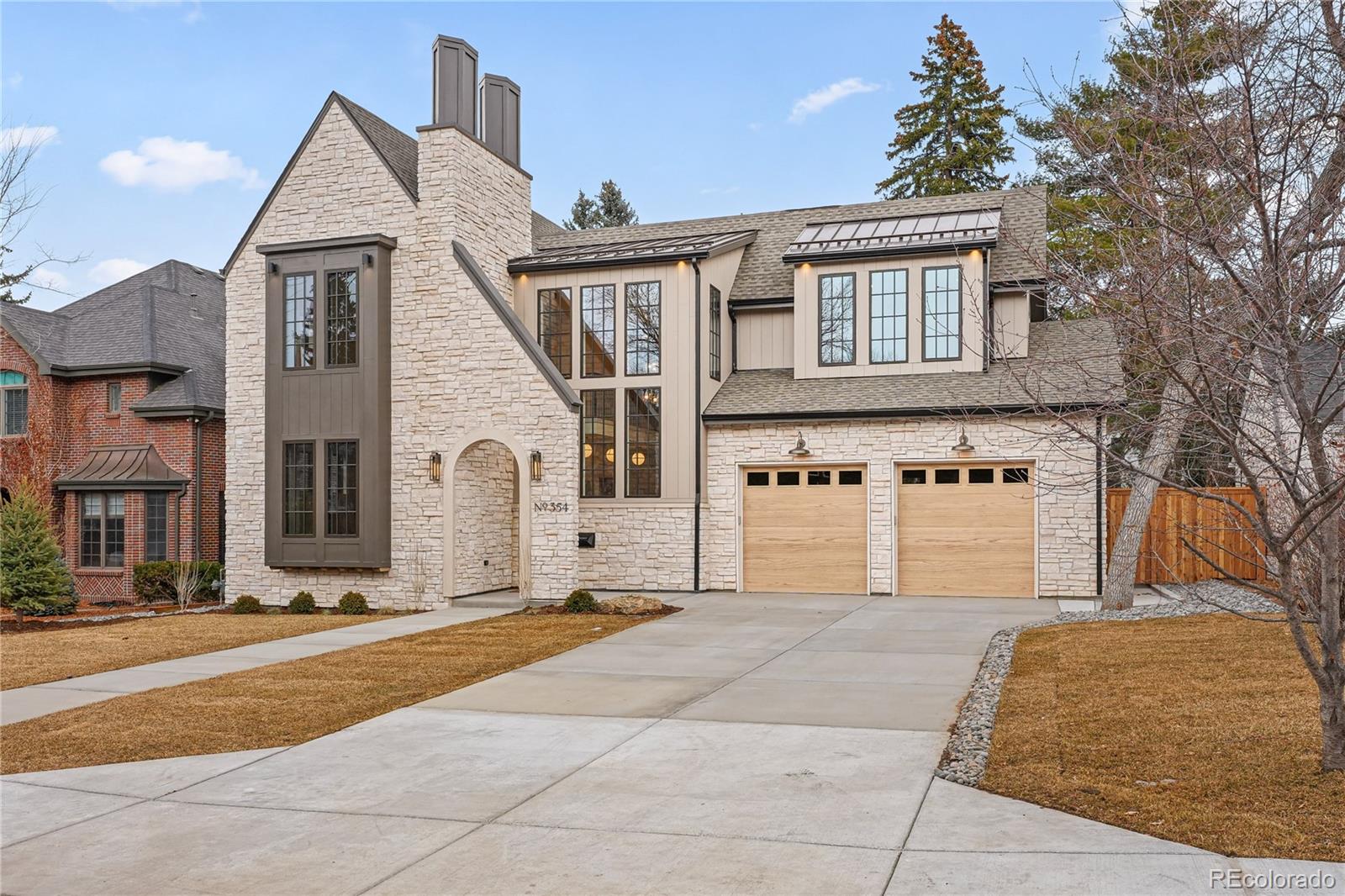 354 Cherry Street Denver, CO 80220 - Photo 4 of 44 a view of a house with snow on the wall