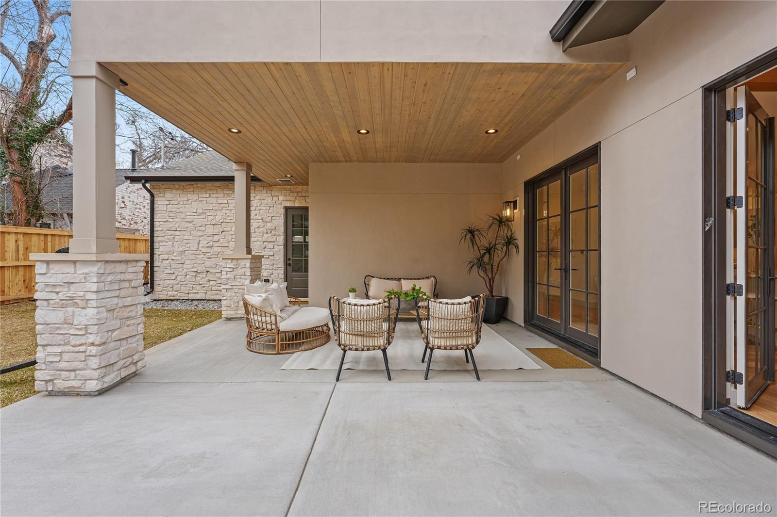 354 Cherry Street Denver, CO 80220 - Photo 41 of 44 a lobby with furniture and floor to ceiling window