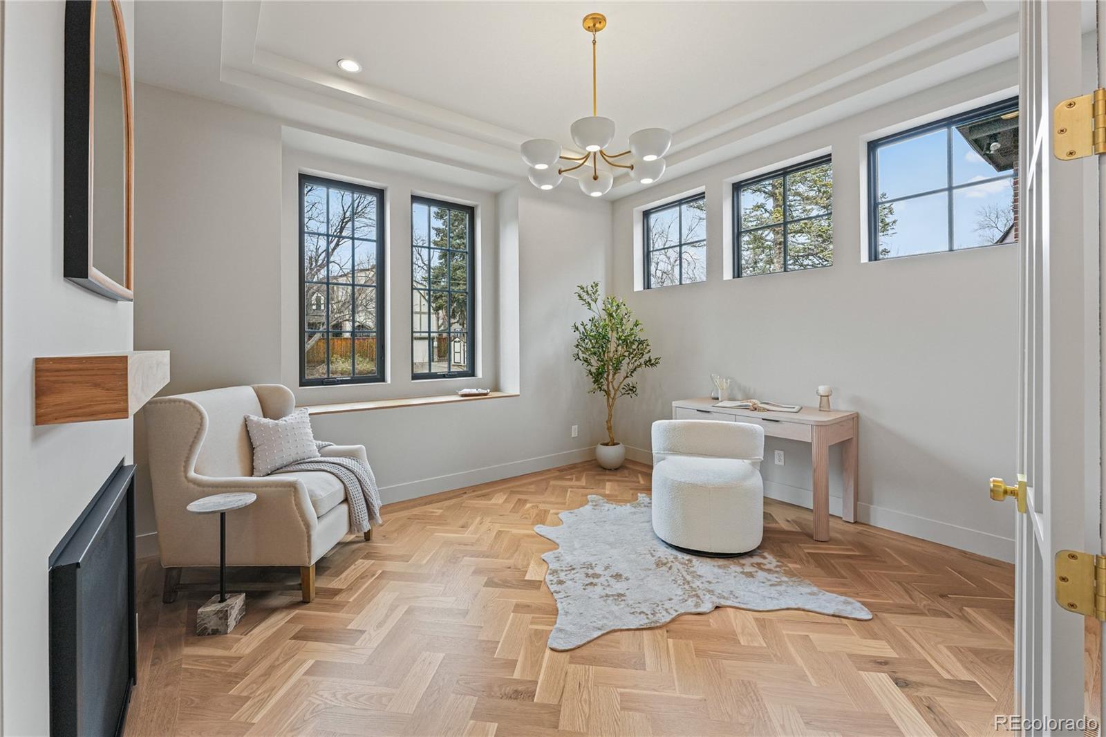 354 Cherry Street Denver, CO 80220 - Photo 7 of 44 a living room with furniture and a window