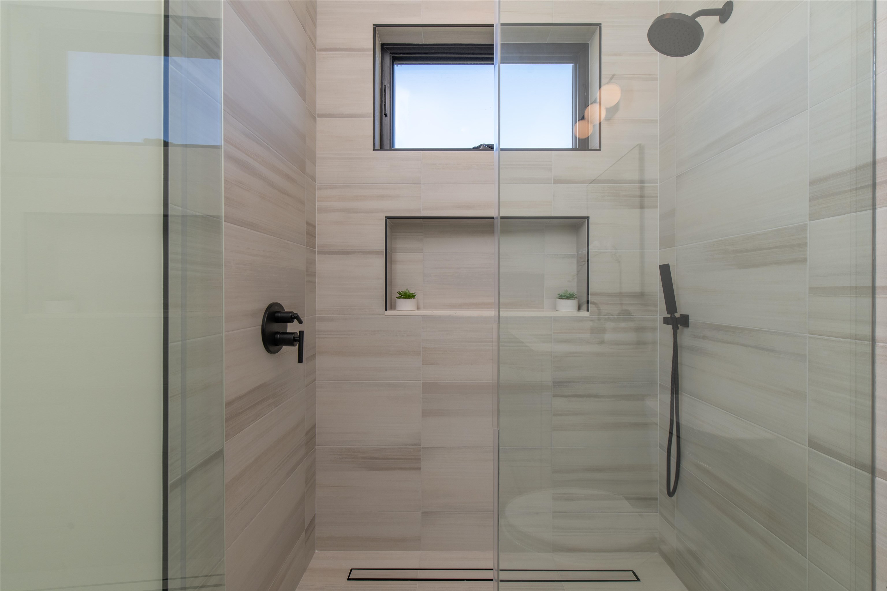 111 Mehana Road, Unit A Haiku, HI 96708 - Photo 17 of 50 a bathroom with a shower