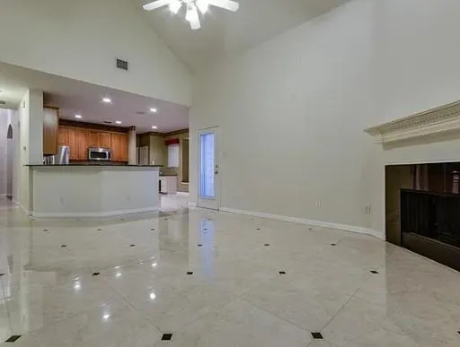 a view of a kitchen with a sink