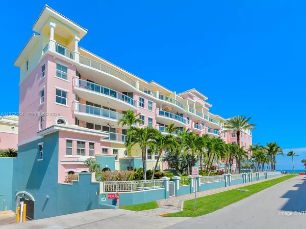 a front view of a building with street view