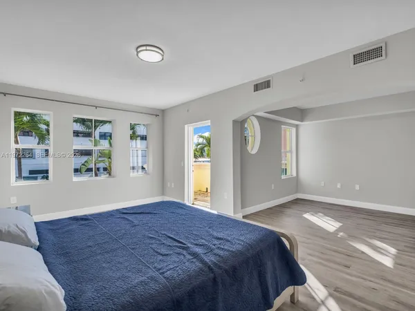 a bathroom with a sink and shower
