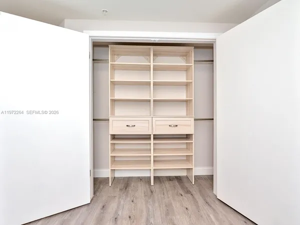 a view of a room with an entryway