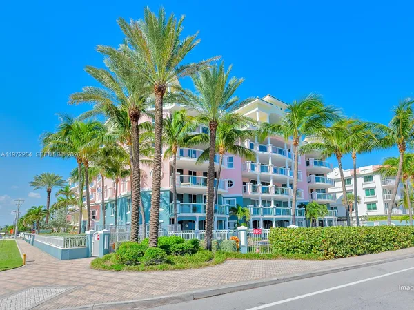 a view of outdoor space with swimming pool and lounge chair