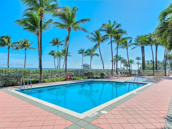 a view of a house with a yard and plants