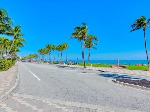 a view of a lake with a big yard