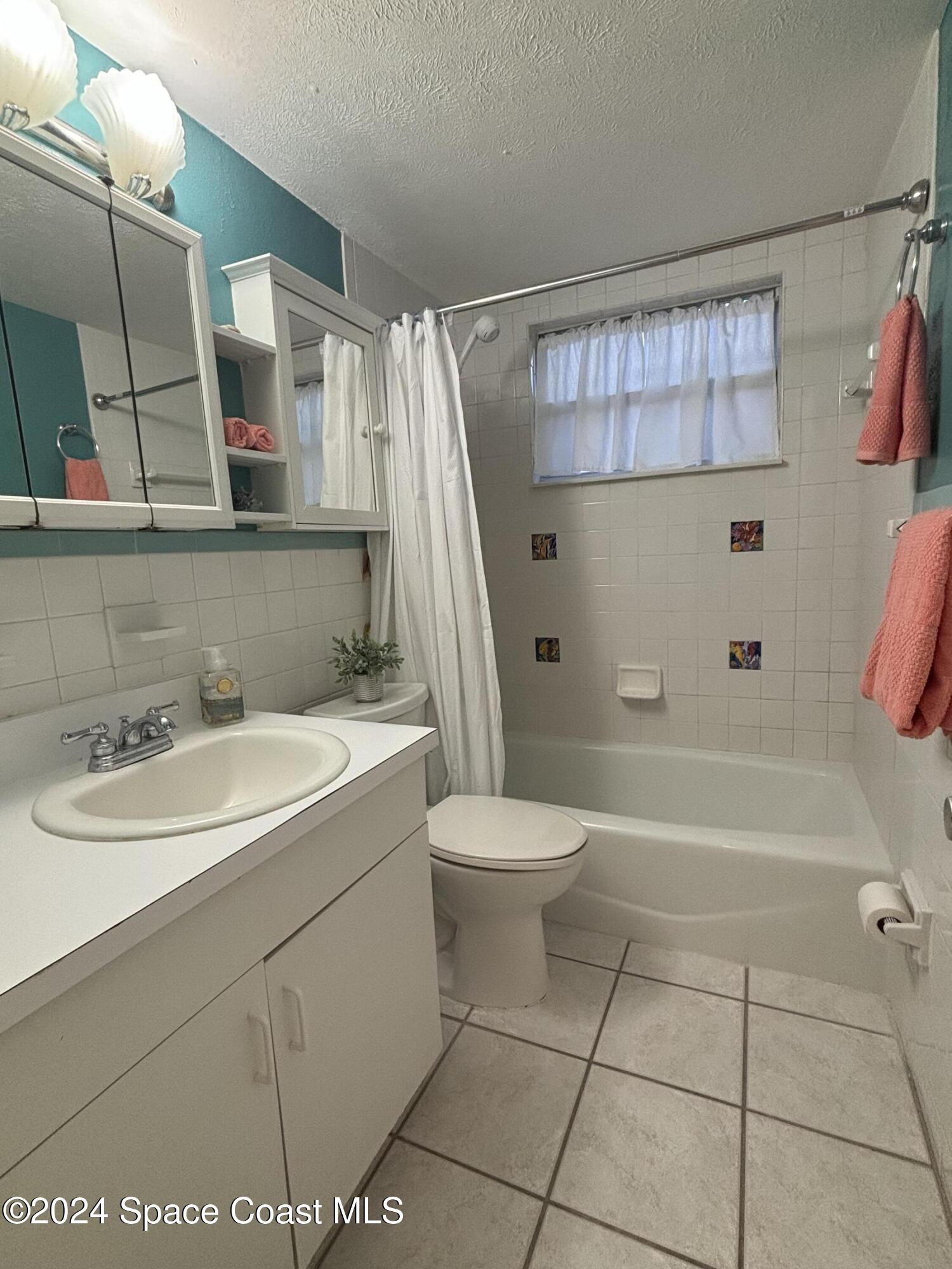 419 Madison Avenue, Unit 102 Cape Canaveral, FL 32920 - Photo 15 of 26 IMG_0839