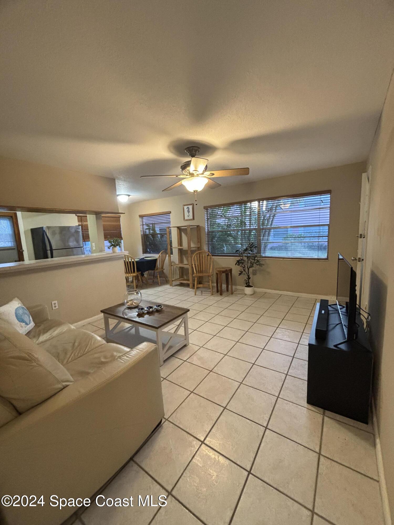419 Madison Avenue, Unit 102 Cape Canaveral, FL 32920 - Photo 5 of 26 IMG_0833