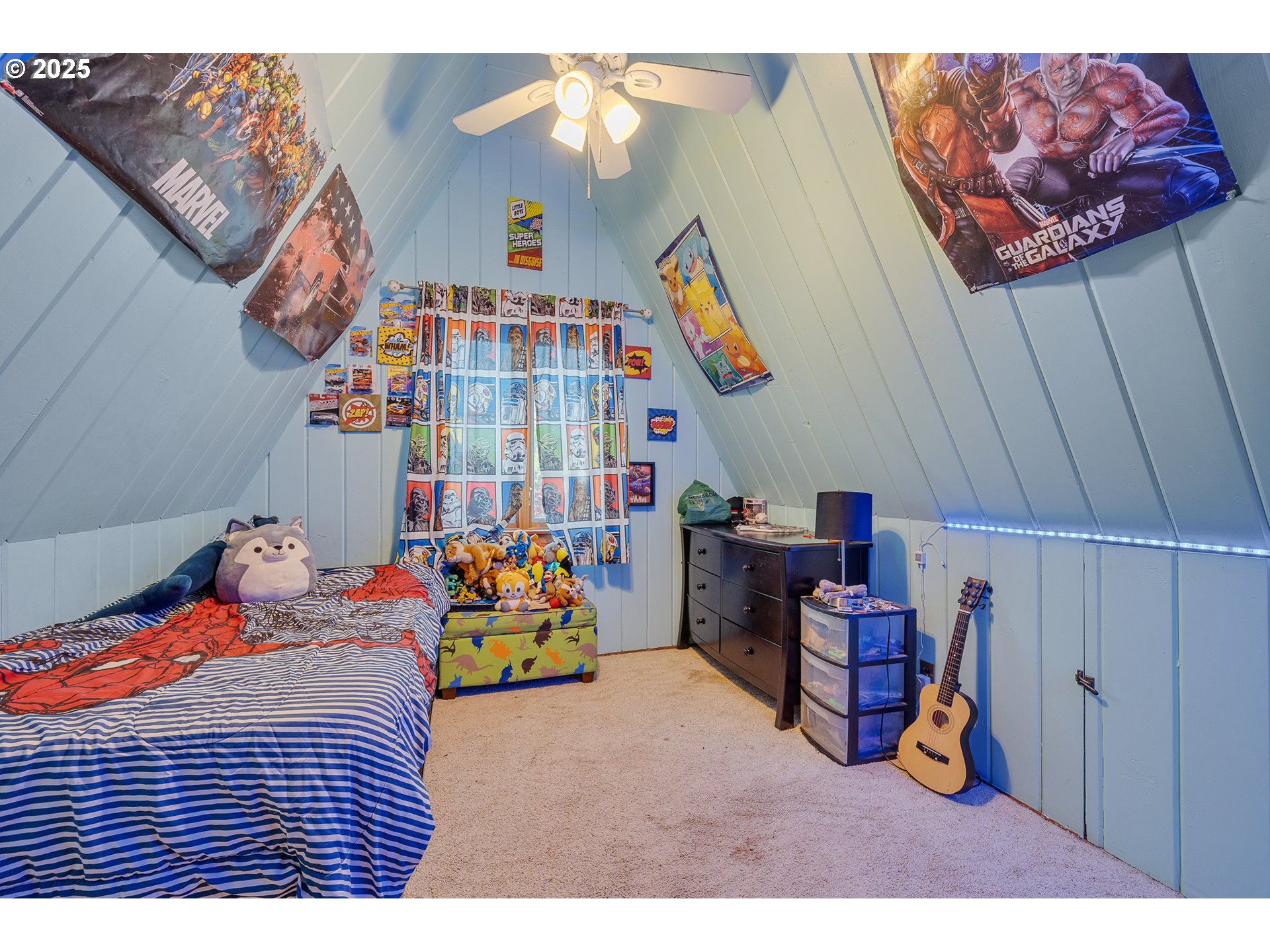 1703 4th Street Tillamook, OR 97141 - Photo 26 of 36 a bedroom with a bed and toys