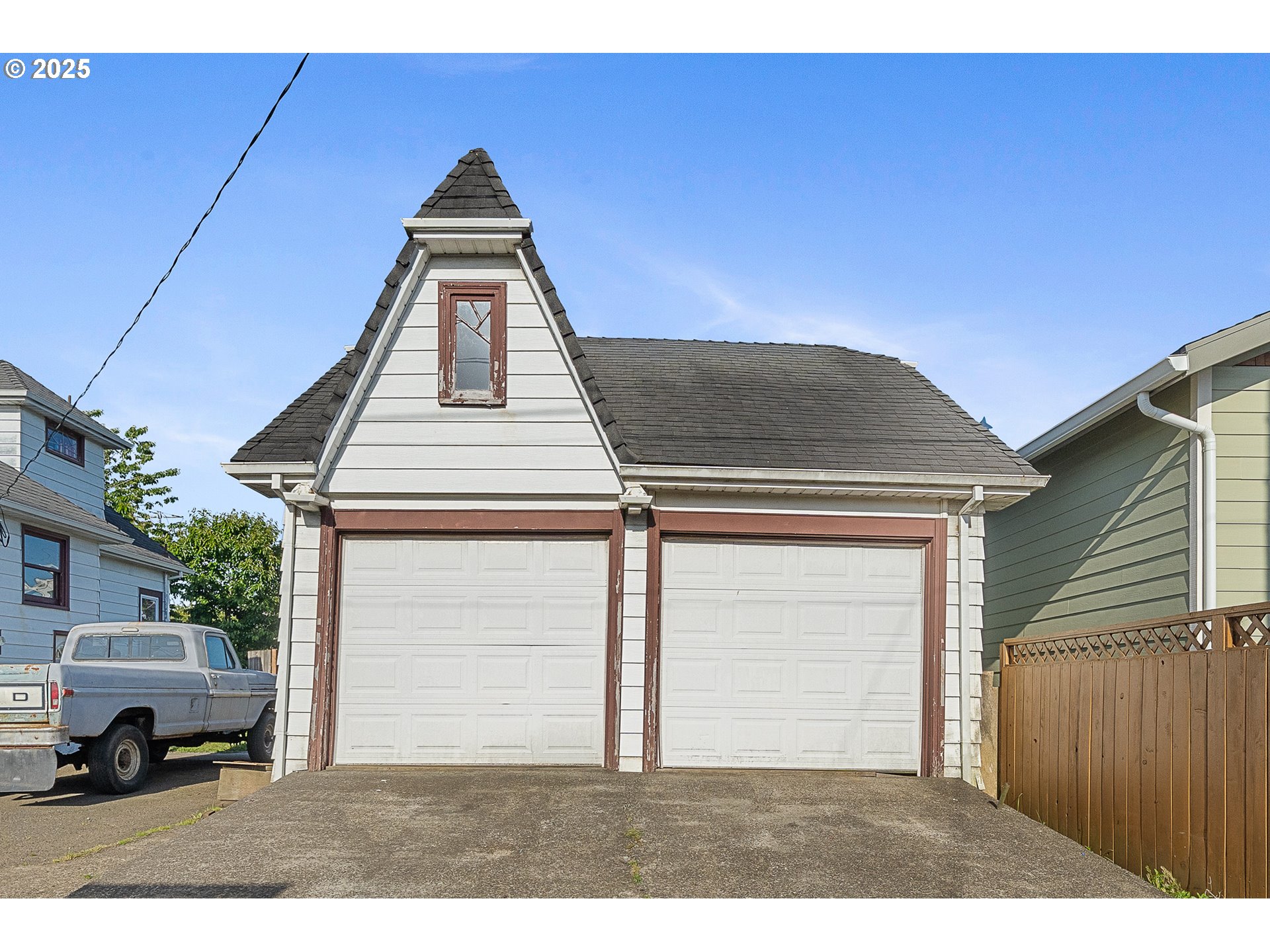 1703 4th Street Tillamook, OR 97141 - Photo 28 of 36 a car parked in front of a house