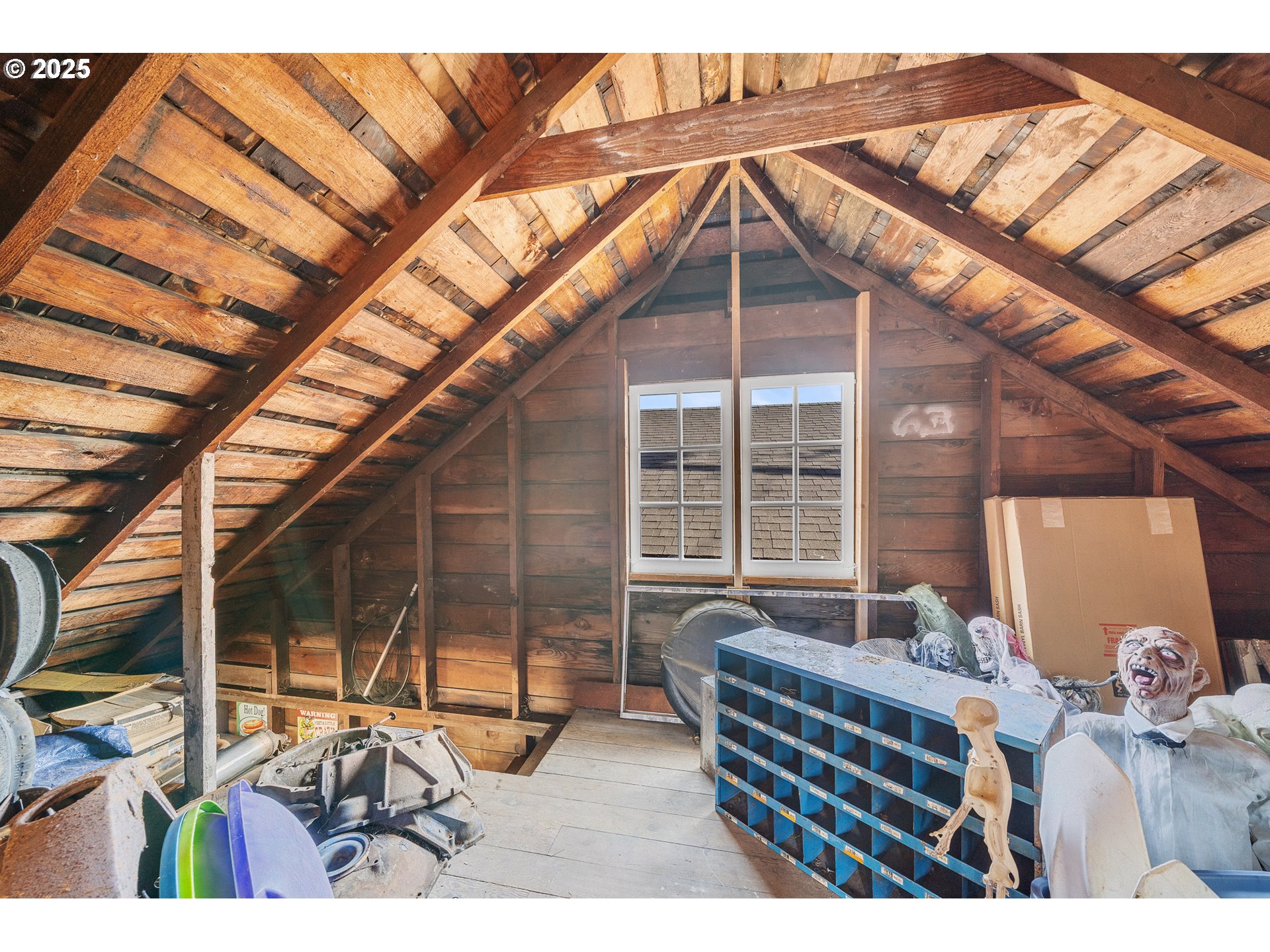 1703 4th Street Tillamook, OR 97141 - Photo 31 of 36 a bedroom with furniture and large window