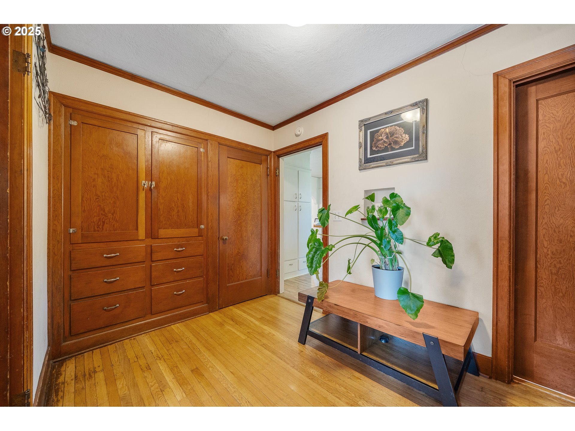 1703 4th Street Tillamook, OR 97141 - Photo 8 of 36 a living room with furniture and a potted plant