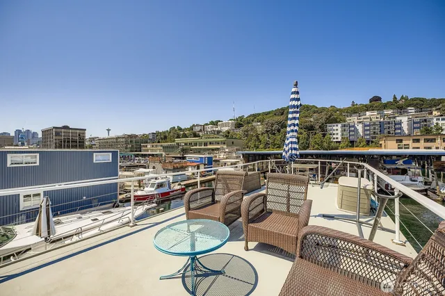 a view of a balcony with chairs