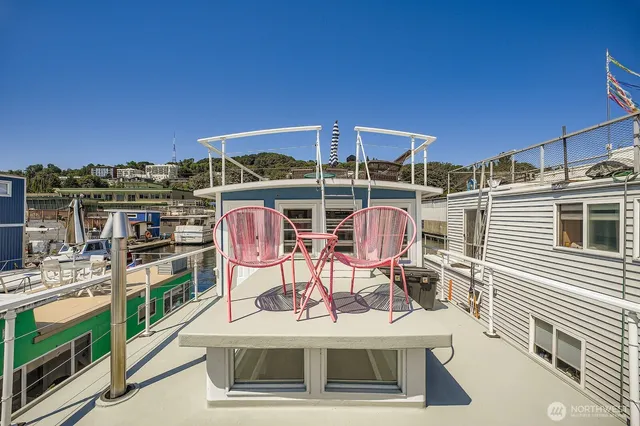 a view of a chairs and table in the patio