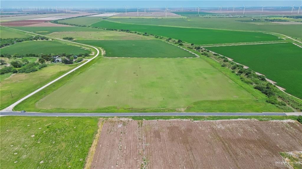 1/2 Farm To Market 506 Santa Rosa, TX 78593 - Photo 4 of 7 Expansive agricultural property featuring a paved road frontage, multiple cultivated fields, and established tree lines