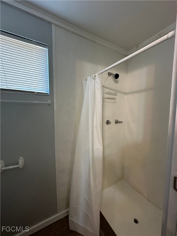 2131 Canal Street, Unit C Fort Myers, FL 33901 - Photo 7 of 10 a bathroom with a shower