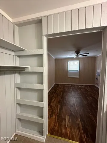 a view of a livingroom with wooden floor