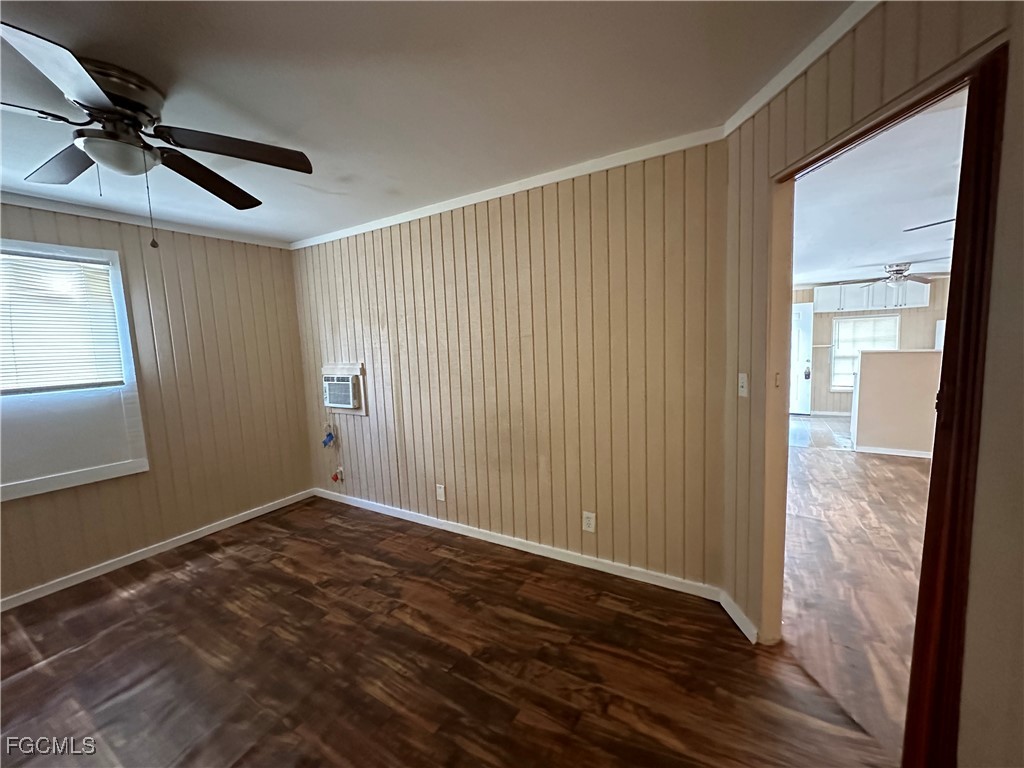 2131 Canal Street, Unit C Fort Myers, FL 33901 - Photo 9 of 10 wooden floor in an empty room with a window