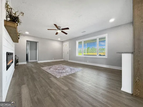 a view of an empty room and window