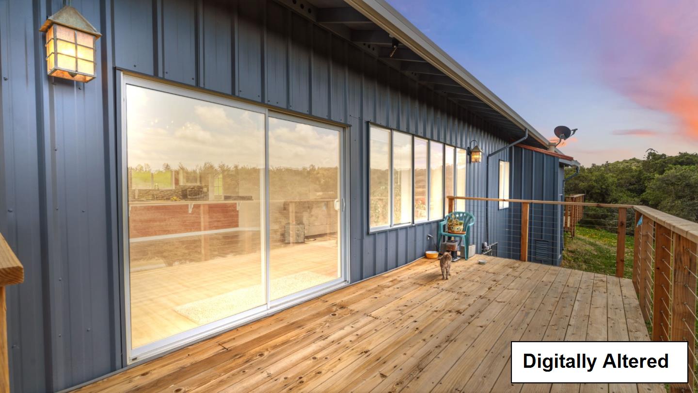 19269 Mallory Canyon Road, Unit D Salinas, CA 93907 - Photo 60 of 77 a bedroom with a bed and large window