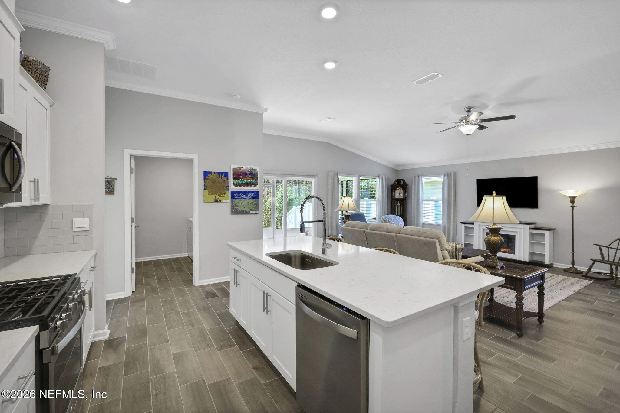 84 Cardinal Branch Lane St. Augustine, FL 32095 - Photo 15 of 45 a kitchen with a sink and wooden floor