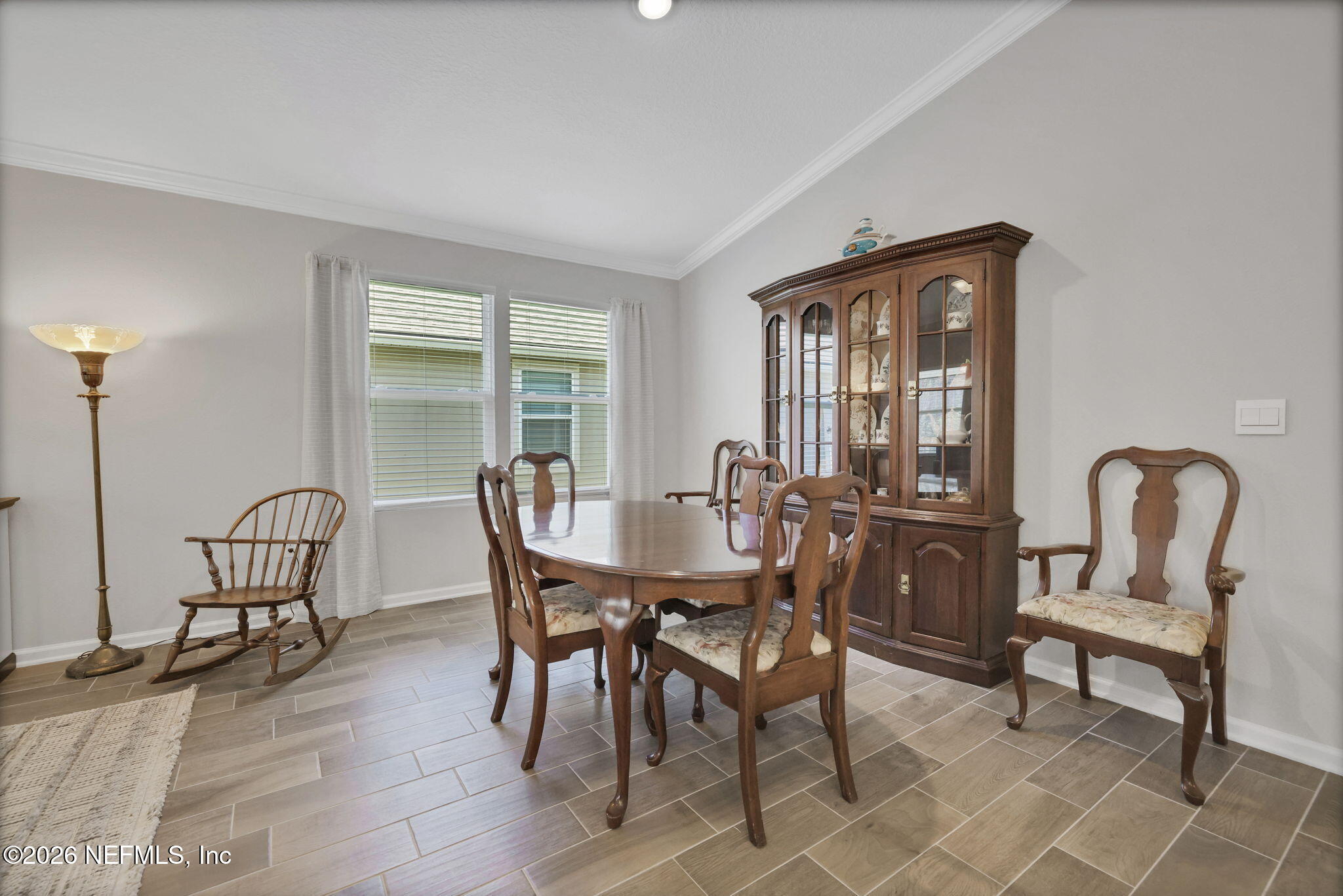 84 Cardinal Branch Lane St. Augustine, FL 32095 - Photo 22 of 45 a view of a dining room with furniture window and wooden floor