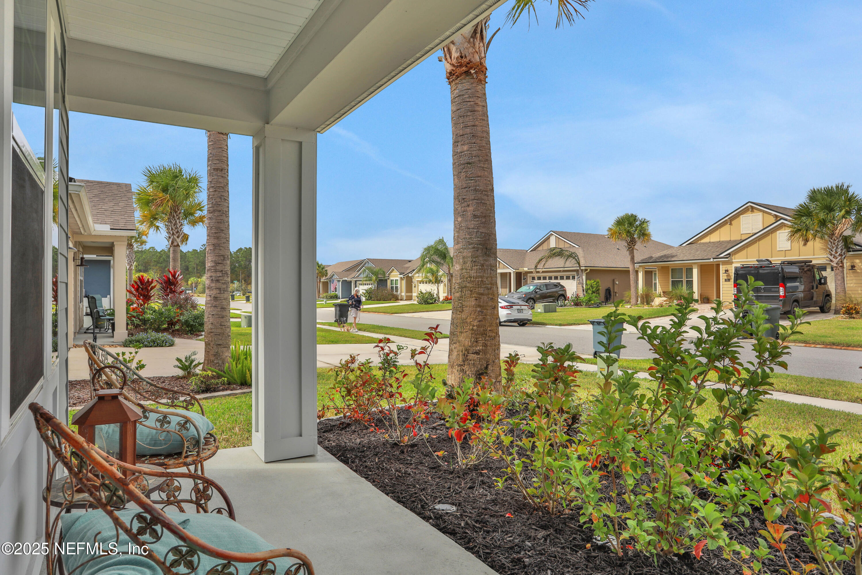 84 Cardinal Branch Lane St. Augustine, FL 32095 - Photo 5 of 45 a front view of a house with outdoor seating