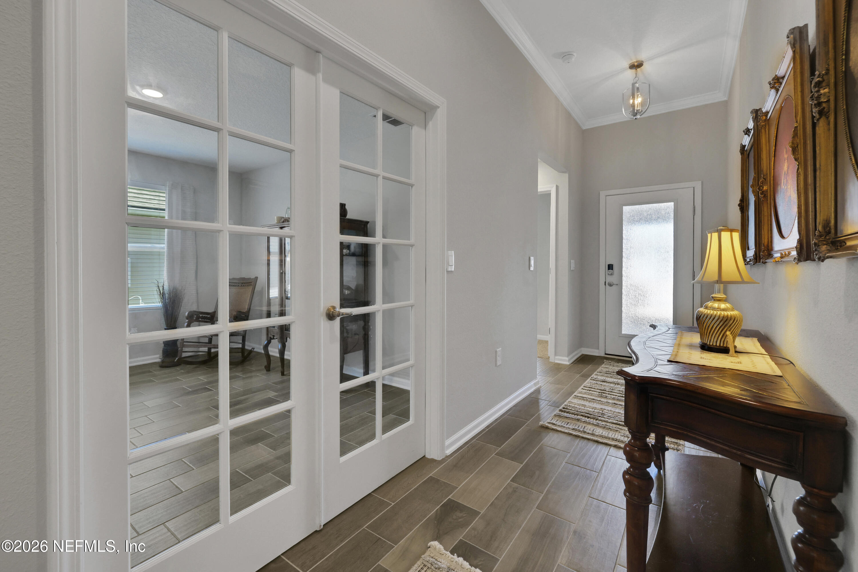 84 Cardinal Branch Lane St. Augustine, FL 32095 - Photo 7 of 45 a workspace with wooden floor and windows