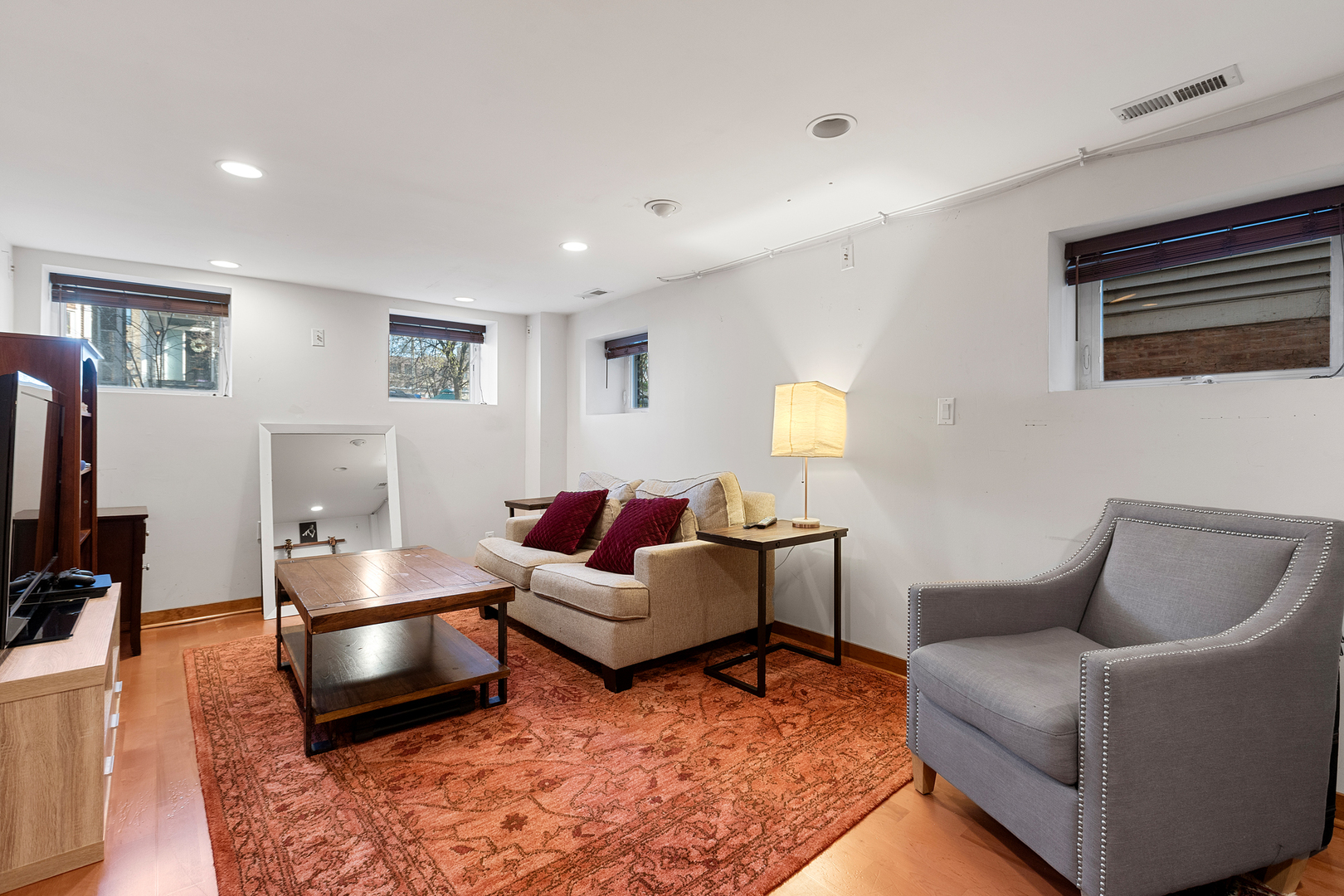 929 West Fletcher Street Chicago, IL 60657 - Photo 21 of 53 a living room with furniture and a flat screen tv