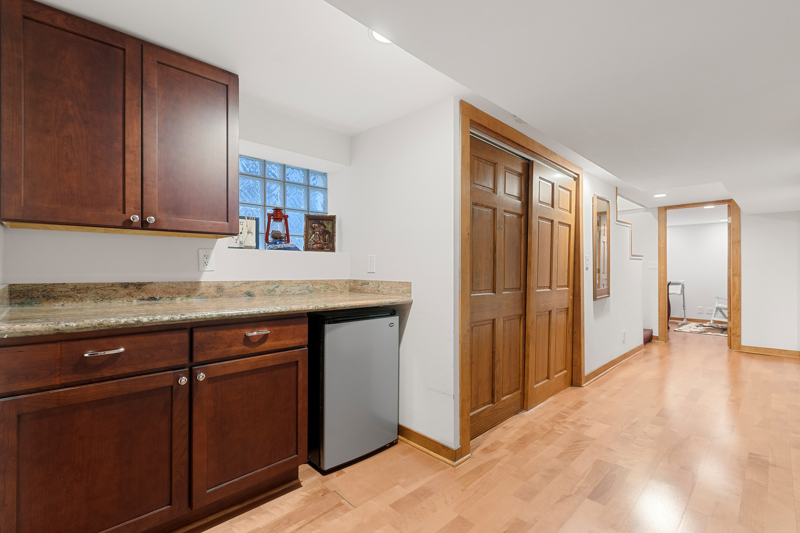929 West Fletcher Street Chicago, IL 60657 - Photo 23 of 53 a kitchen with granite countertop cabinets and refrigerator