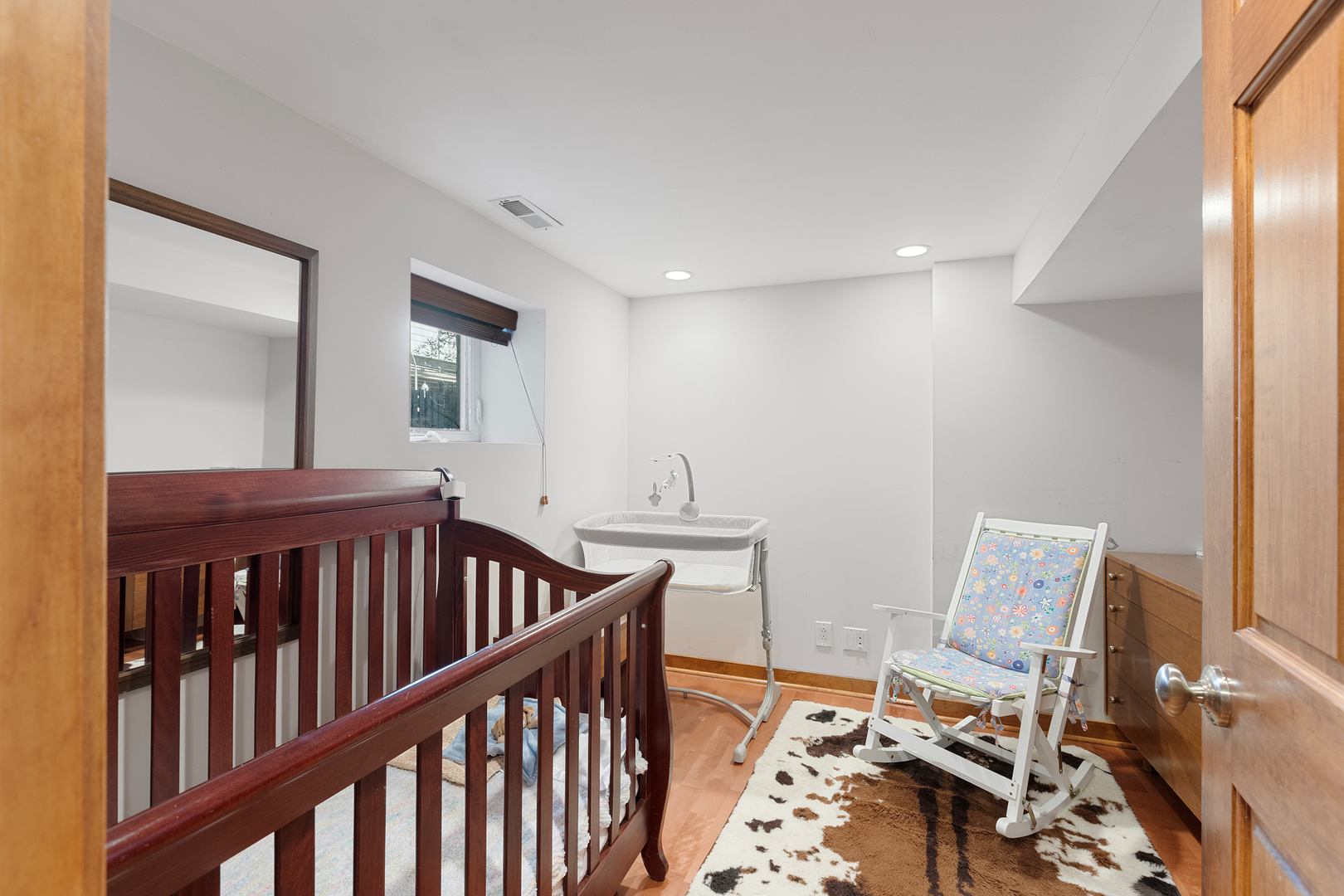 929 West Fletcher Street Chicago, IL 60657 - Photo 27 of 53 a bedroom with furniture and a window